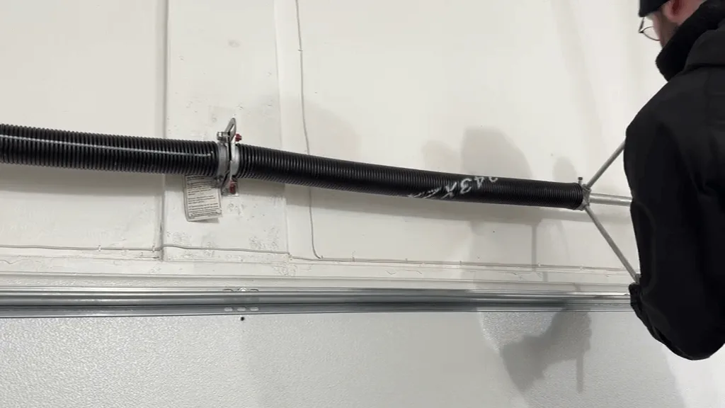 A new high-cycle garage door torsion spring installed by Garage Door Pro